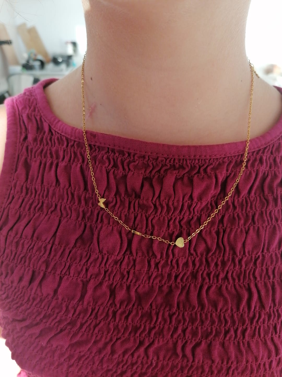 Customer photo review of Colar de Iniciais Laterais Personalizado