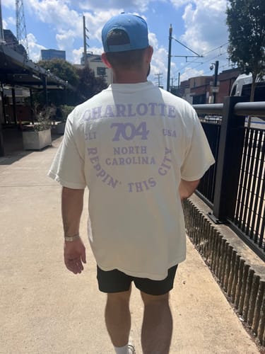 Customer photo review of Glory Days Apparel - Reppin' This City Off-White/Lavender Heavy Oversized T-Shirt