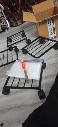 Customer photo review of United Crafts Rozy Wheel Pot Stands for Planters