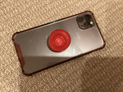 Customer photo review of Lil Red Clown Phone Grip