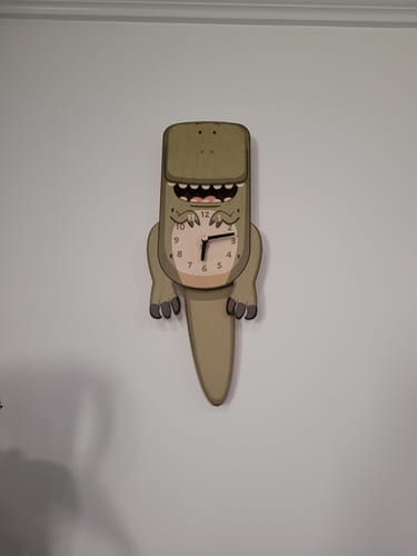 Customer photo review of Ralphie the T-Rex Pendulum Clock