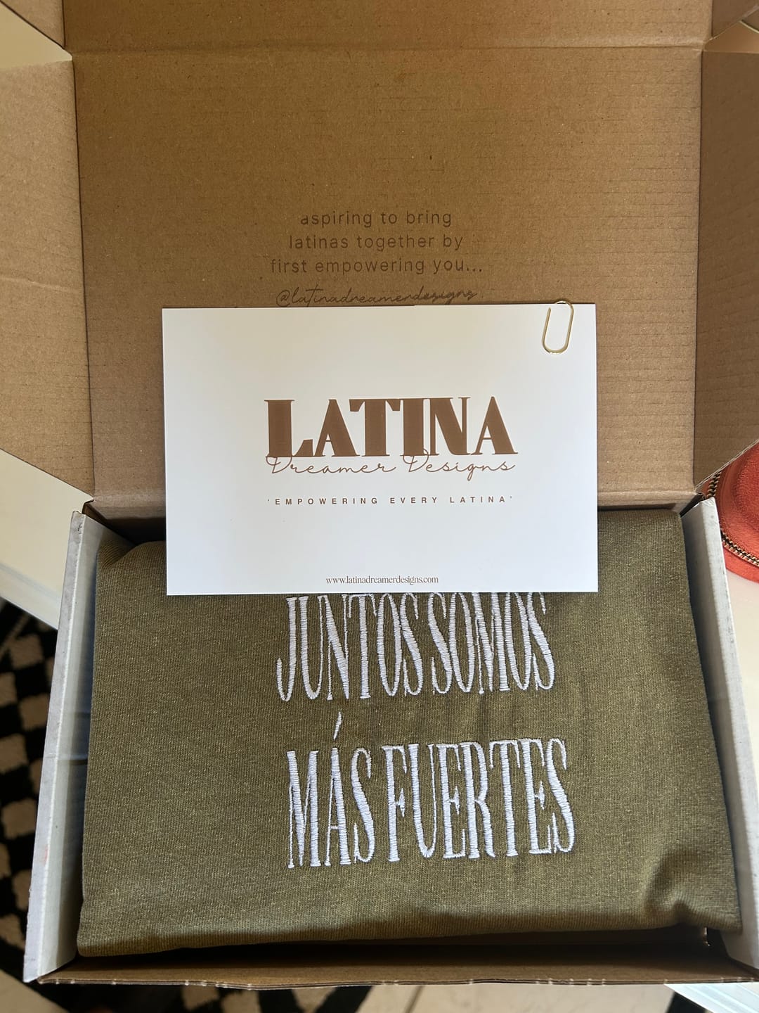 Customer photo review of 'Juntos Somos Más Fuertes' Embroidered Shirt