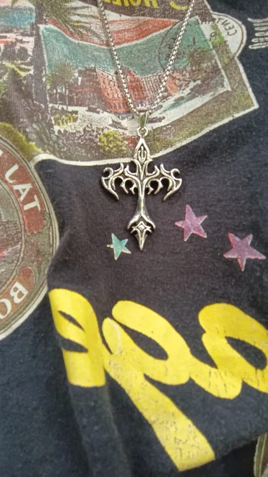 Customer photo review of Flame Cross Necklace
