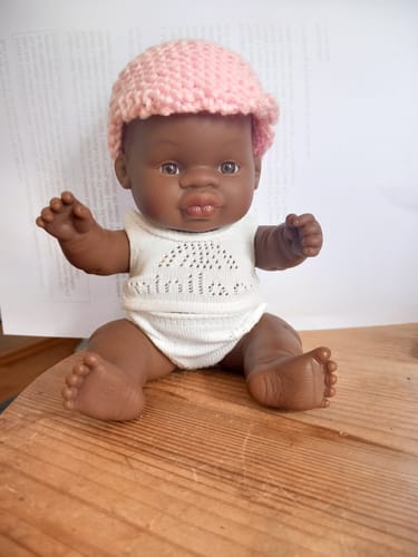 Customer photo review of African Boy Baby Doll 21cm | Miniland