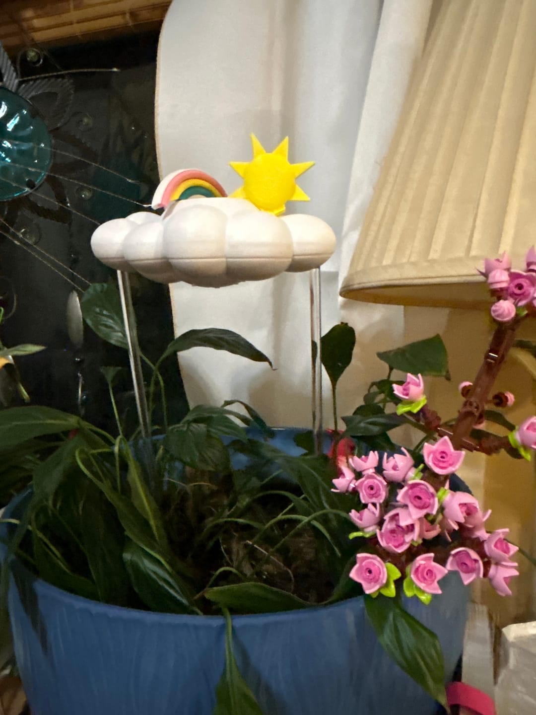 Customer photo review of Original Dripping Rain Cloud with Sun and Pastel Rainbow Charms