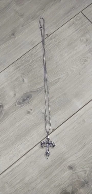 Customer photo review of Flame Cross Necklace