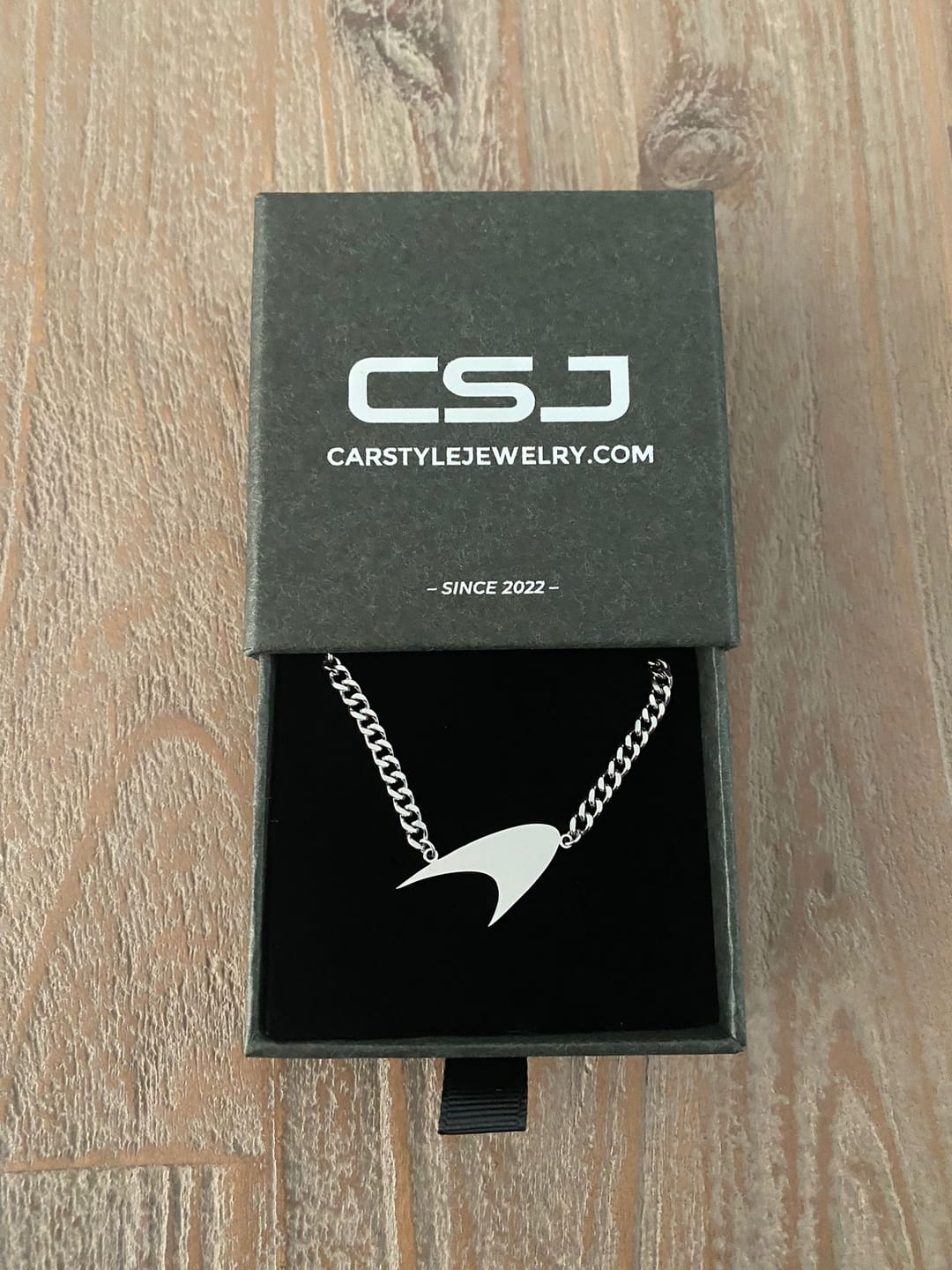 Customer photo review of Swoosh Necklace