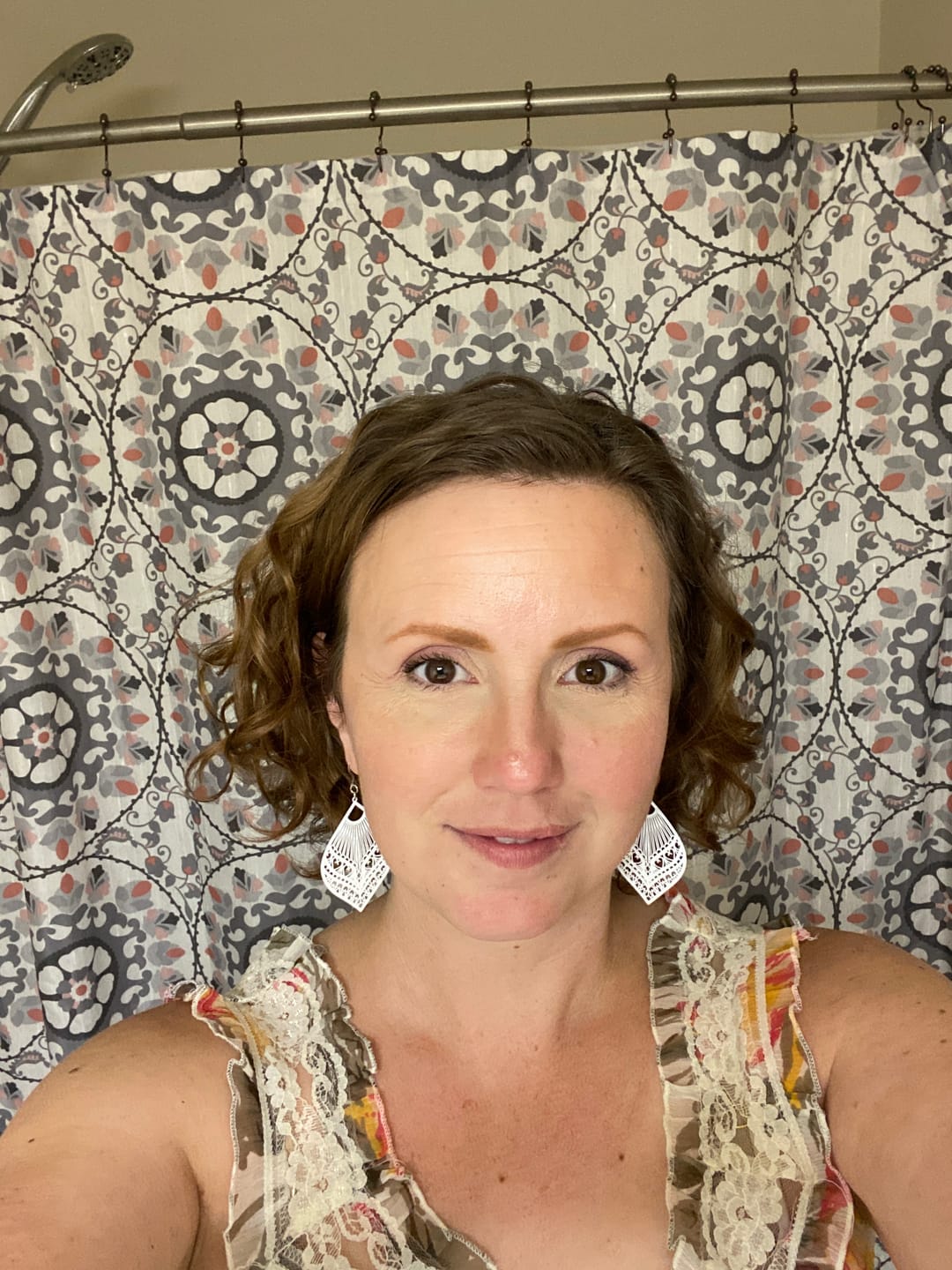 Customer photo review of Large Peacock Dangles Hypoallergenic Earrings for Sensitive Ears Made with Plastic Posts