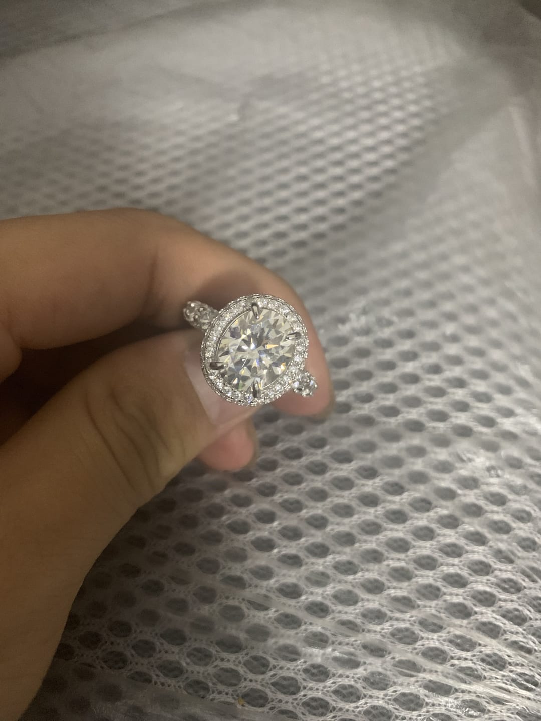 Customer photo review of Gorgeous Hidden Halo Oval Cut 4.0ct Engagement Ring In Sterling Silver