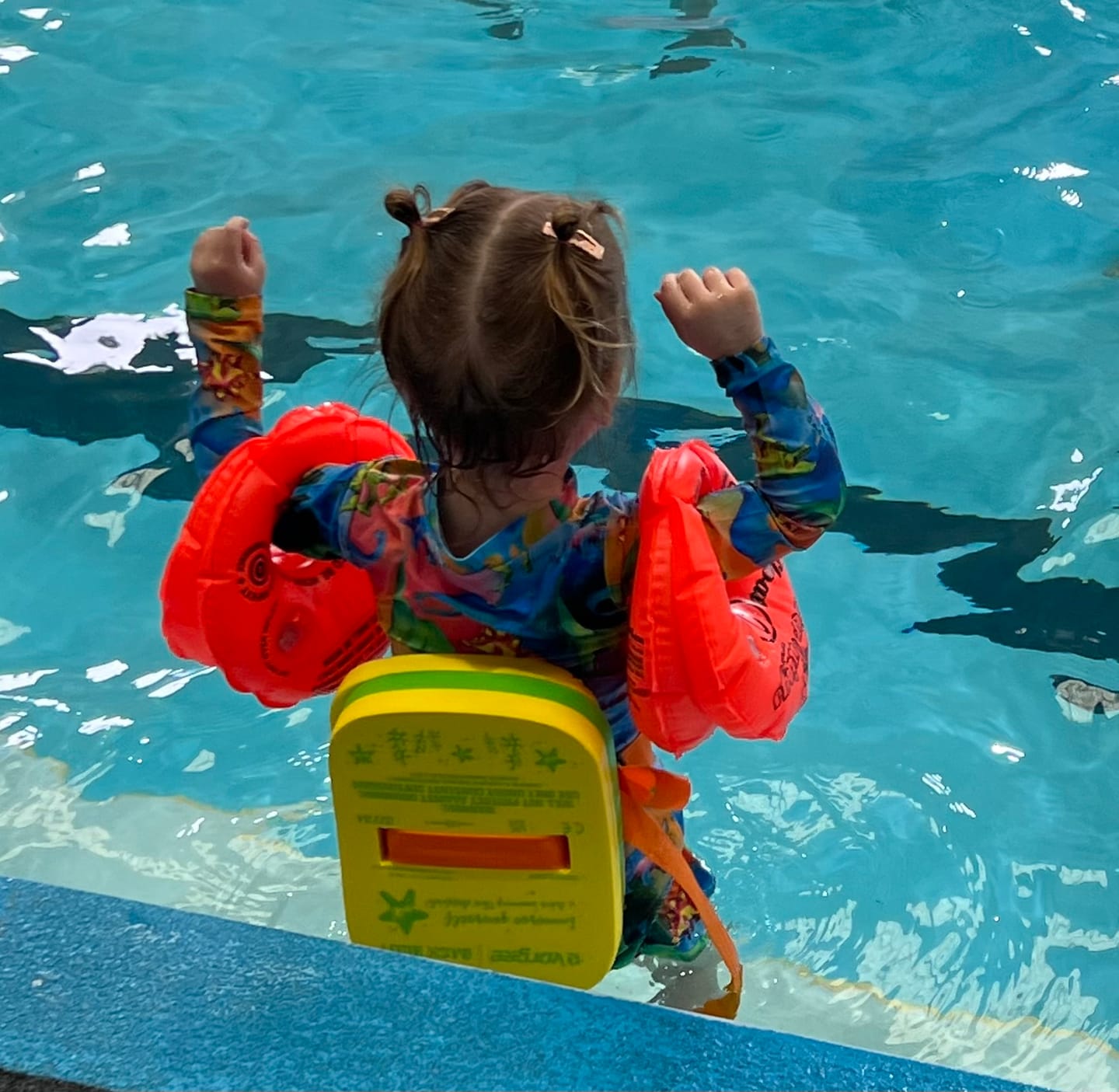 Customer photo review of Rainbow-saurus Girls Long Sleeve Zip Swimmers