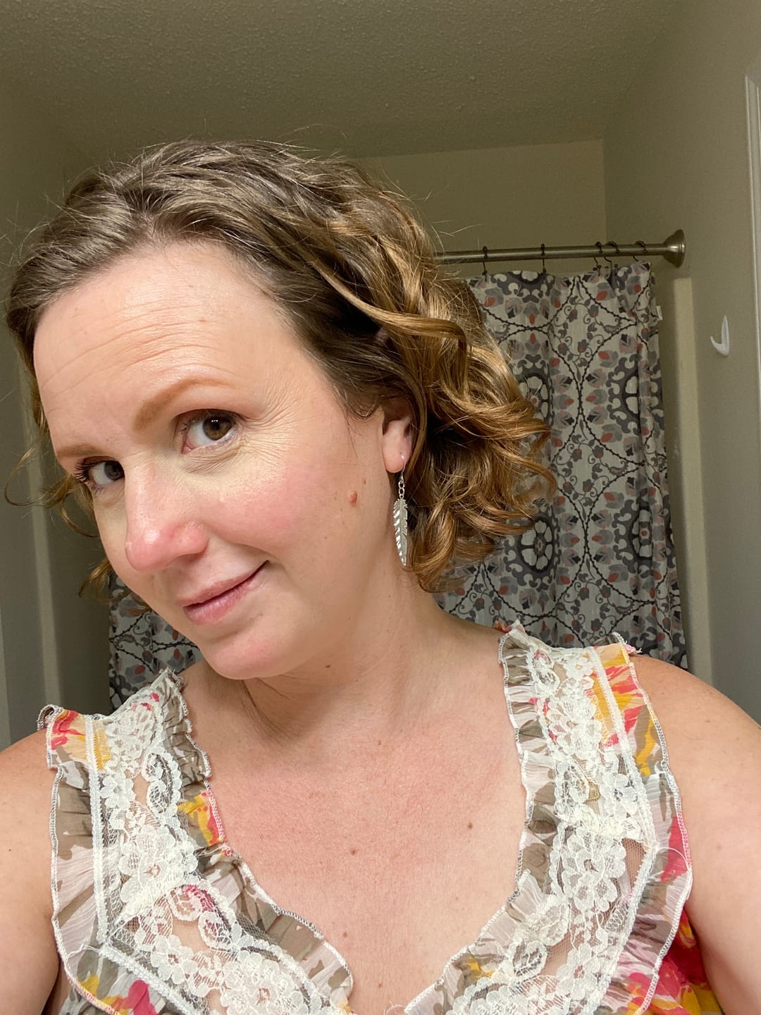 Customer photo review of Dainty Feather Dangles Hypoallergenic Earrings for Sensitive Ears Made with Plastic Posts
