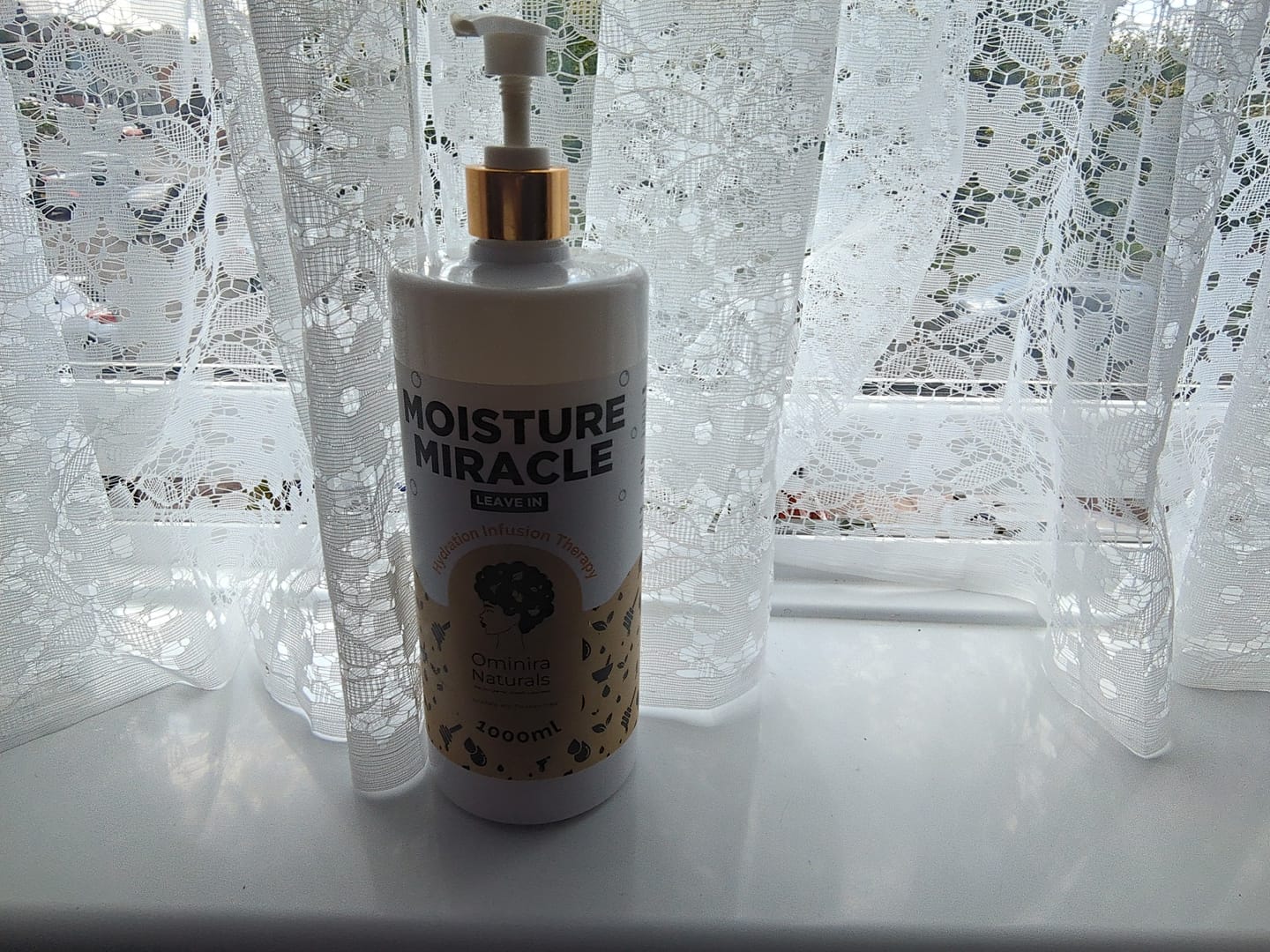 Customer photo review of Moisture Miracle – Leave-in Conditioner