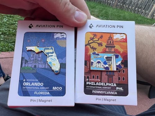 Customer photo review of Airport Enamel Pin | MCO - Florida