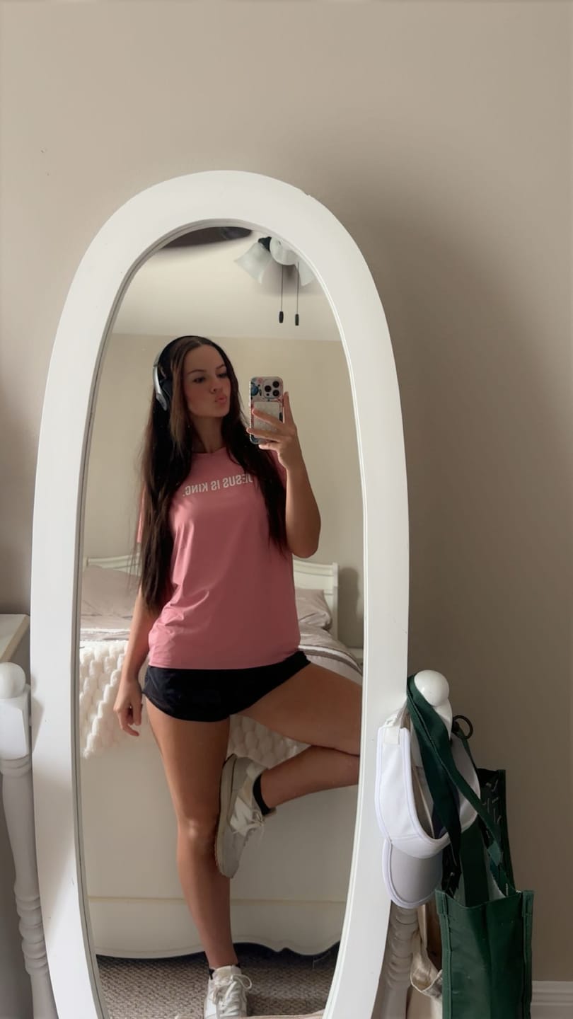 Customer photo review of Women's Jesus Is King Performance Tee