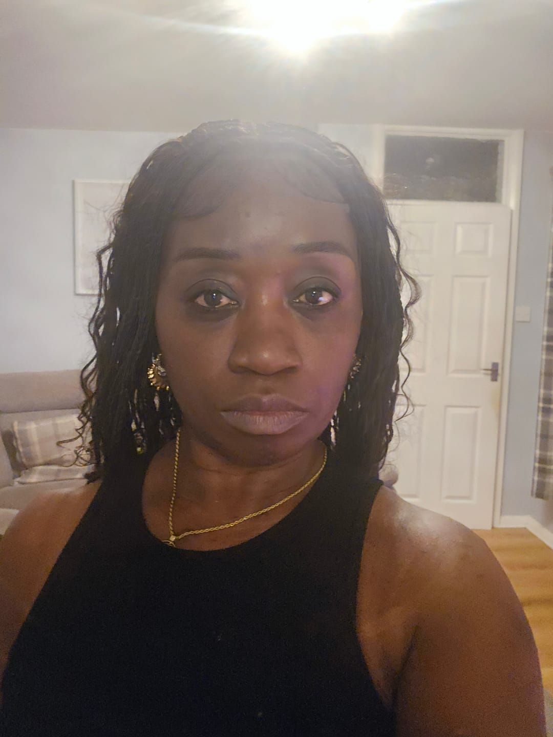 Customer photo review of Kora - Pre Bleached Human Hair Lace Lightweight Knotless Swiss HD Lace Box Braided Wig 100 Strands