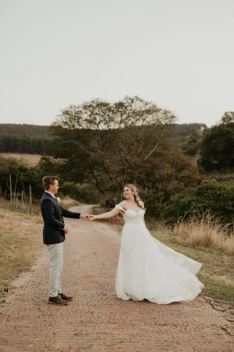 Customer photo review of White Lace Off The Shoulder Wedding Dress With Slit