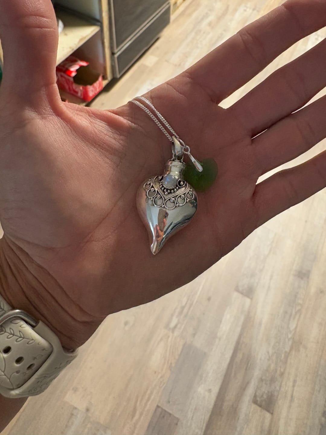Customer photo review of Birthstone Cremation Necklace Heart Urns
