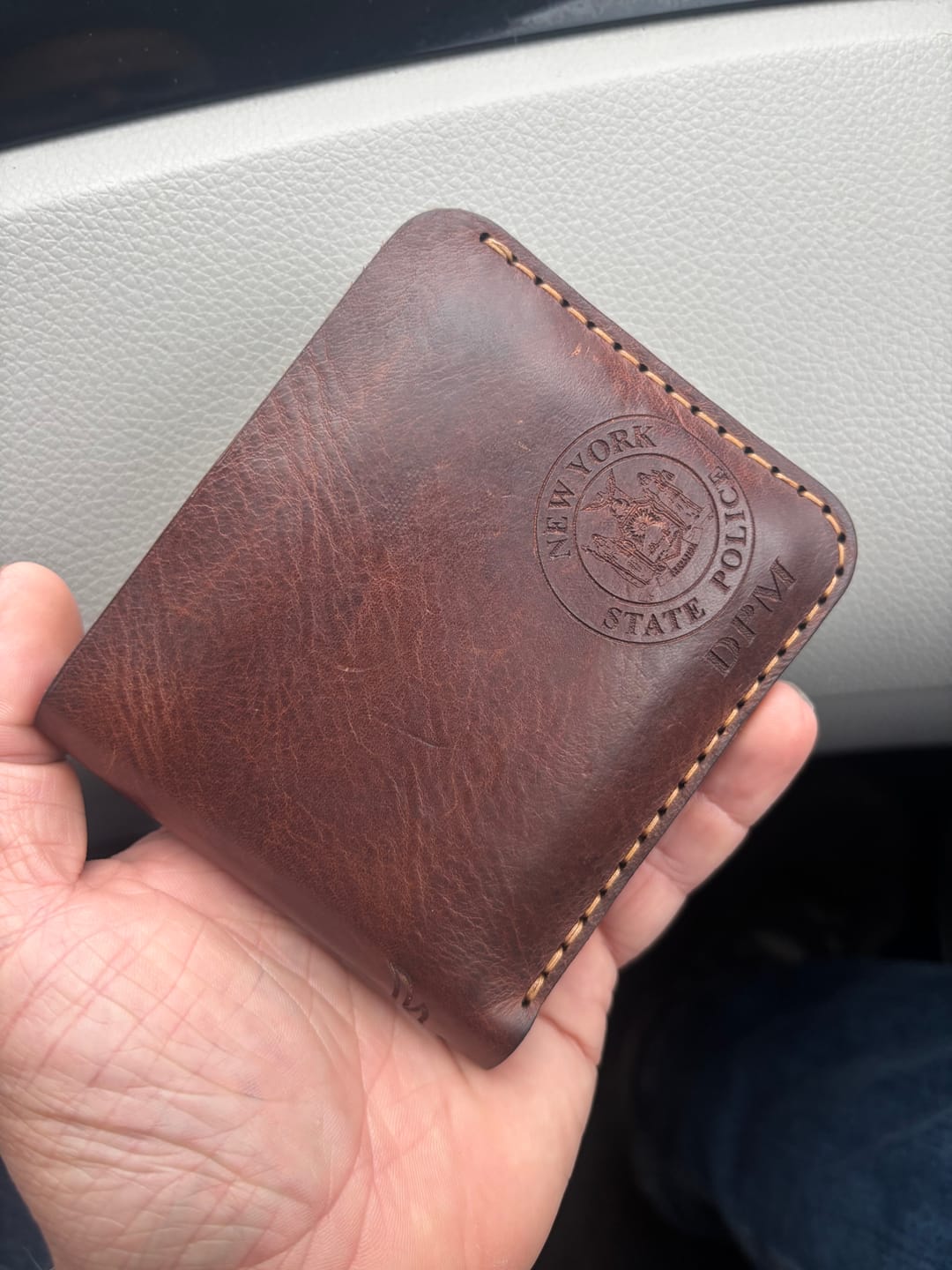 Customer photo review of Badge Bifold Wallet