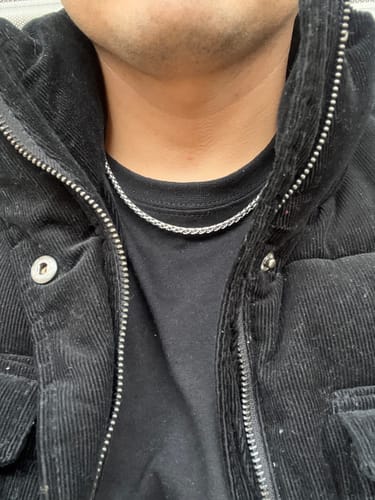 Reseña con foto de un cliente sobre Cadena Snake
