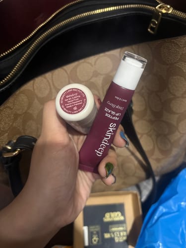 Customer photo review of VELVET FLUSH - Lip+Cheek Blush
