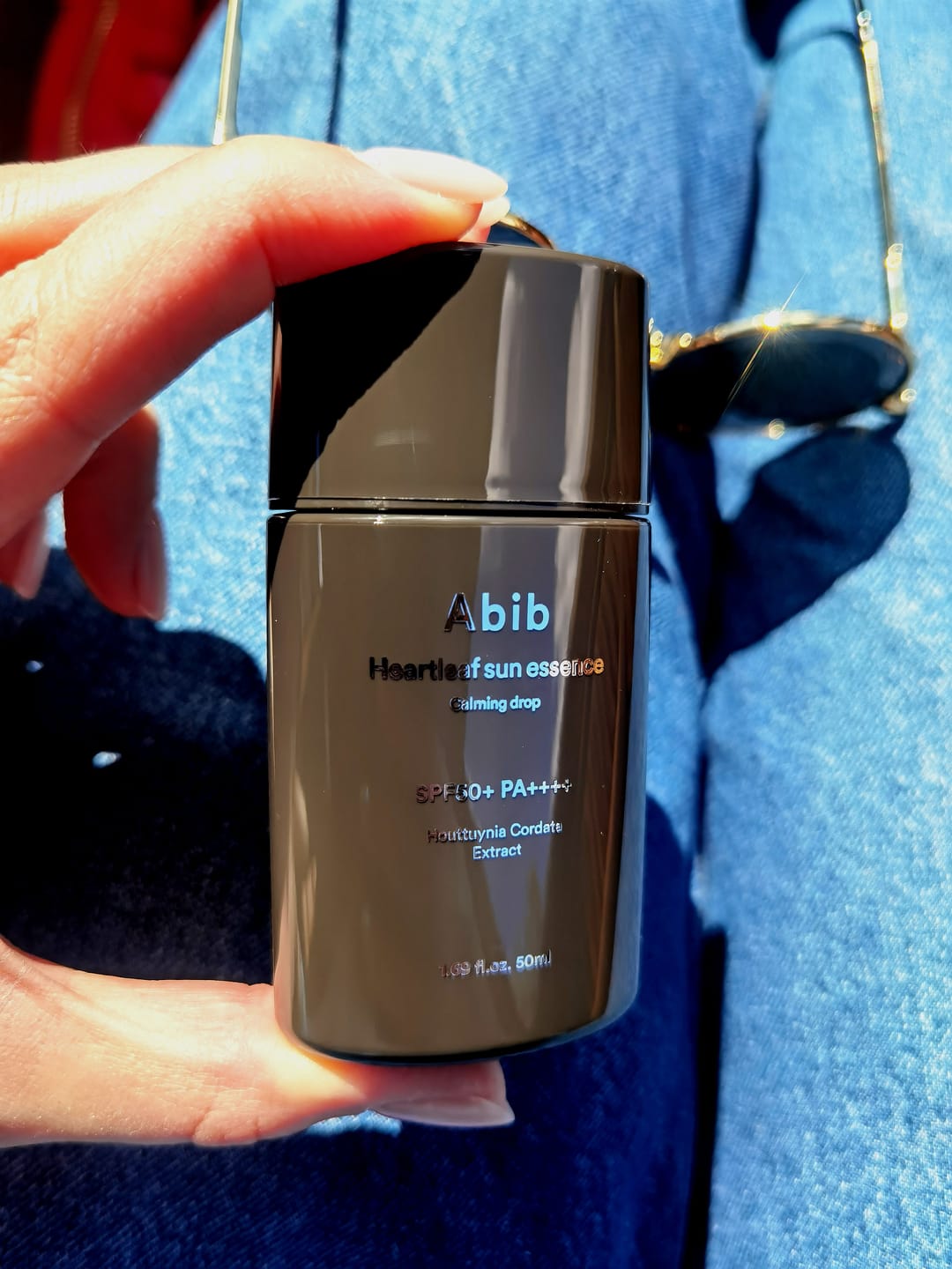 Customer photo review of Nomierinoša saules aizsargesence Abib Heartleaf Sun Essence Calming Drop