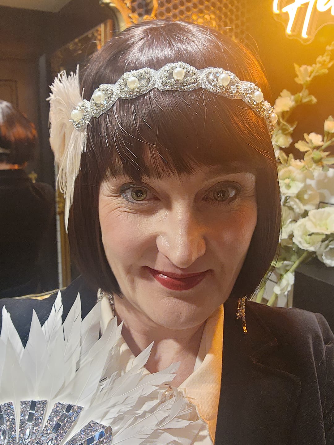 Customer photo review of Blush Deco & Pearl Feather Headband