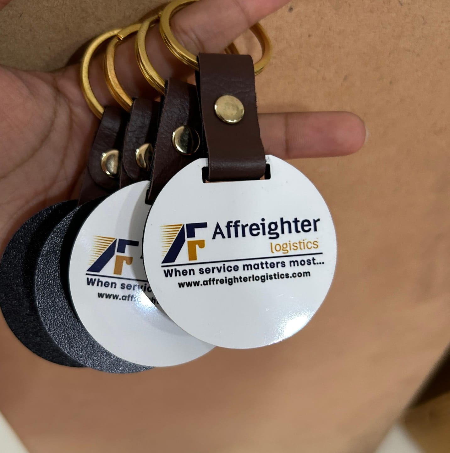 Customer photo review of Customized Premium Belt Keychains | Best for Brand Promotion | PrintMine.in