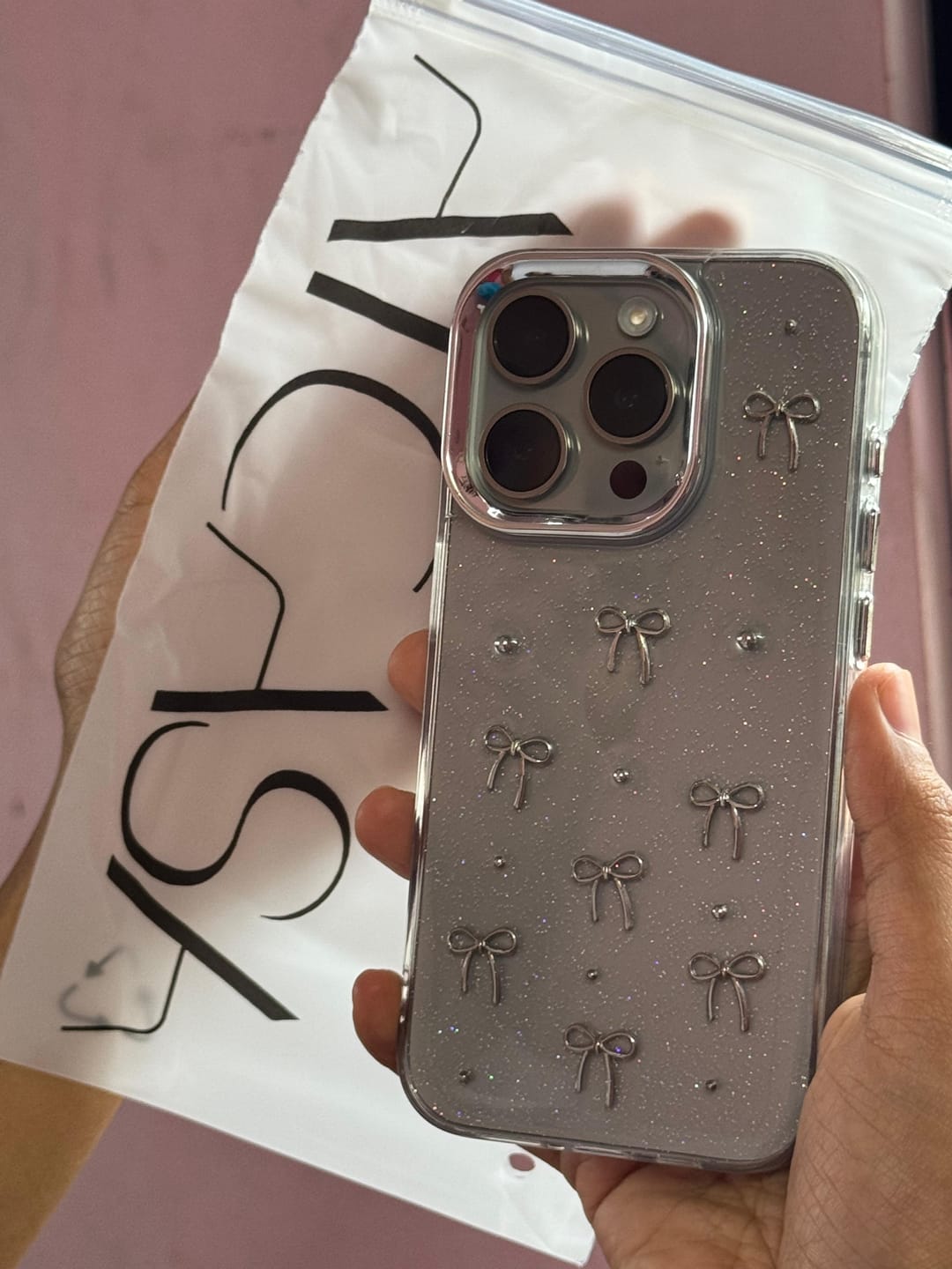 Customer photo review of 3D Glitter Silver Bow Transparent iPhone Case