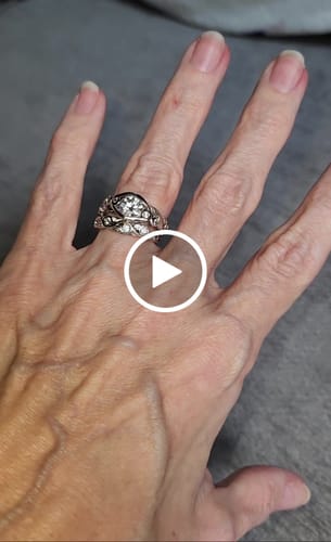 Customer video review of Bezel Set Round Moissanite Scroll Accents Engagement Ring
