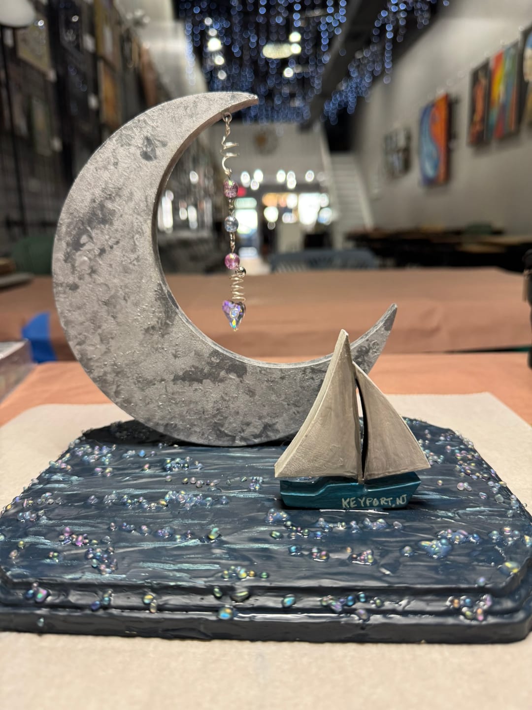 Customer photo review of Unfinished Wood Crescent Moon Shape | DIY Celestial Night Sky Craft Cutout | Up to 36"