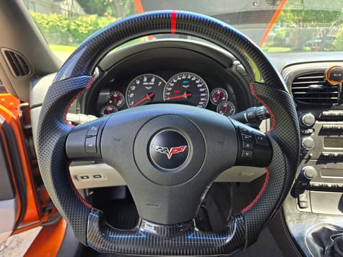 Customer photo review of Genuine Carbon Fiber Steering Wheel With Button Trim For C6 Corvette 2006-2011
