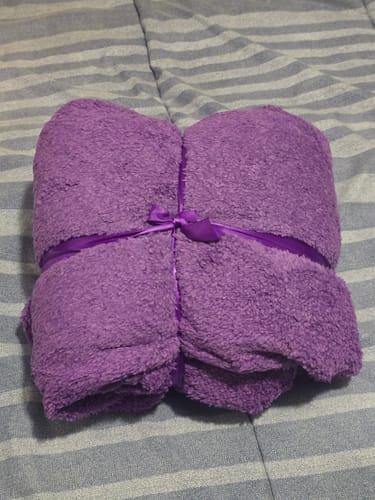 Coperta impermeabile in uso su letto