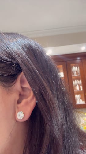 Customer photo review of M & Co. Basket Setting Diamond Stud Earrings
