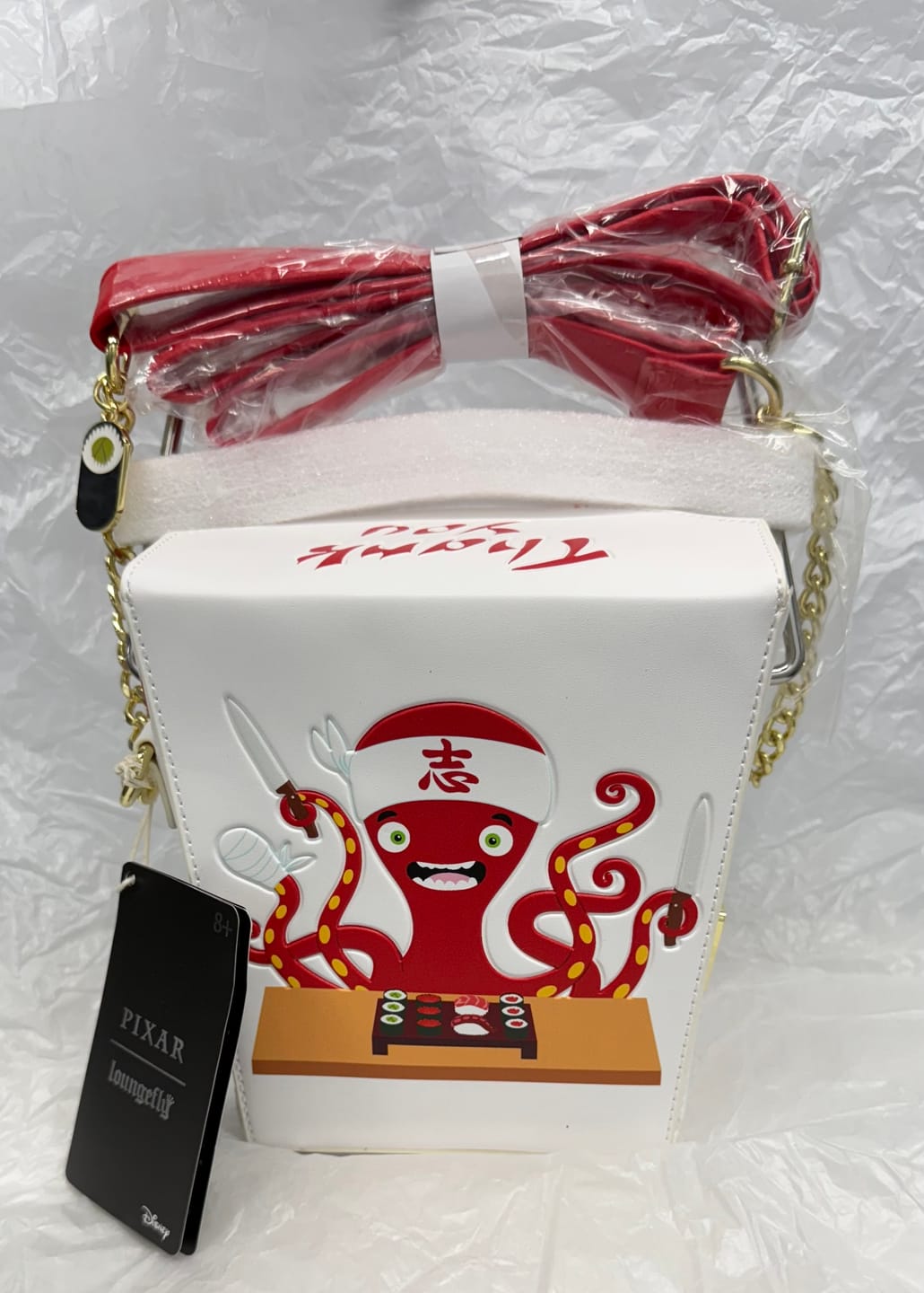 Customer photo review of Loungefly Disney Pixar Monsters Inc Harryhausen's Take Out Crossbody Bag
