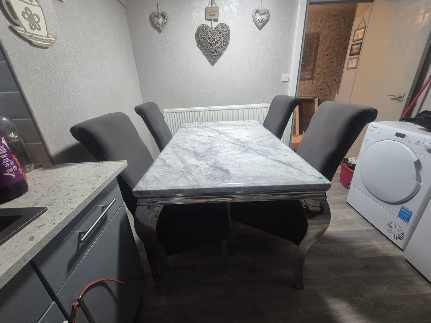 Customer photo review of Vienna Marble Top Dining Set With Lucy Lion Knocker Velvet Chairs