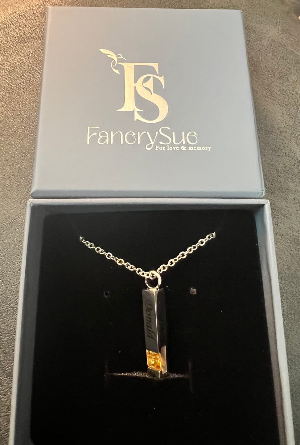 Customer photo review of Vertical Bar Birthstone Urn Necklaces for Ashes