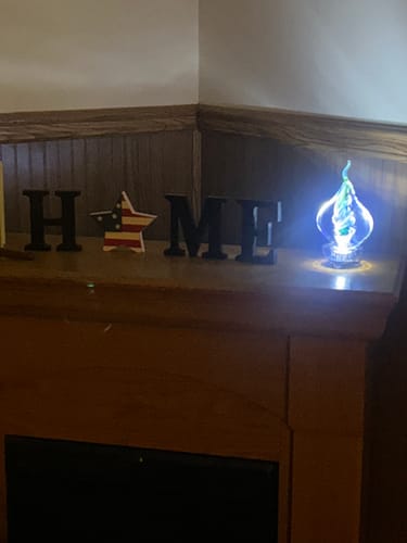 Customer photo review of Illuminated Tri-Color Glass Flame Paperweight with Ashes