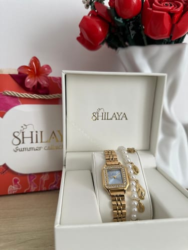 Customer photo review of COFFRET ALOHA SHELLS MONTRE AUX CHOIX & BRACELET
