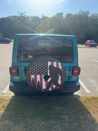 Customer photo review of Bigfoot or Sasquatch American Flag Spare Tire Cover for Bronco, Jeep, Camper, RV, & More