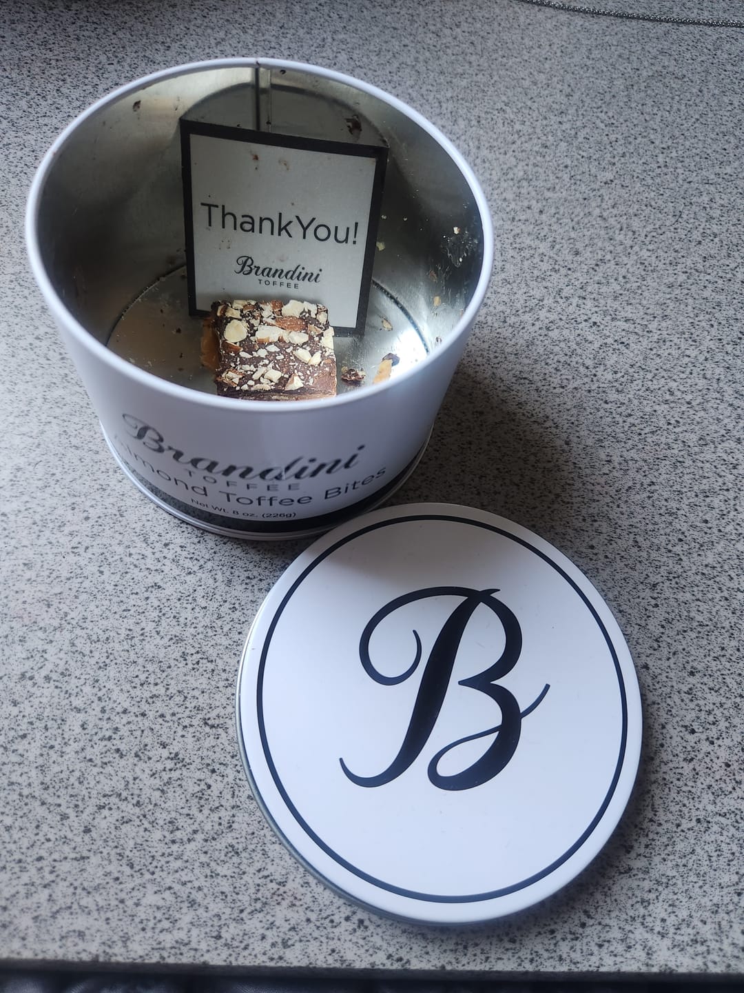 Customer photo review of 1/2 LB Tin Almond Toffee Bites