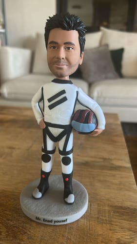 Customer photo review of בובת MINI ME - נהג מרוצים