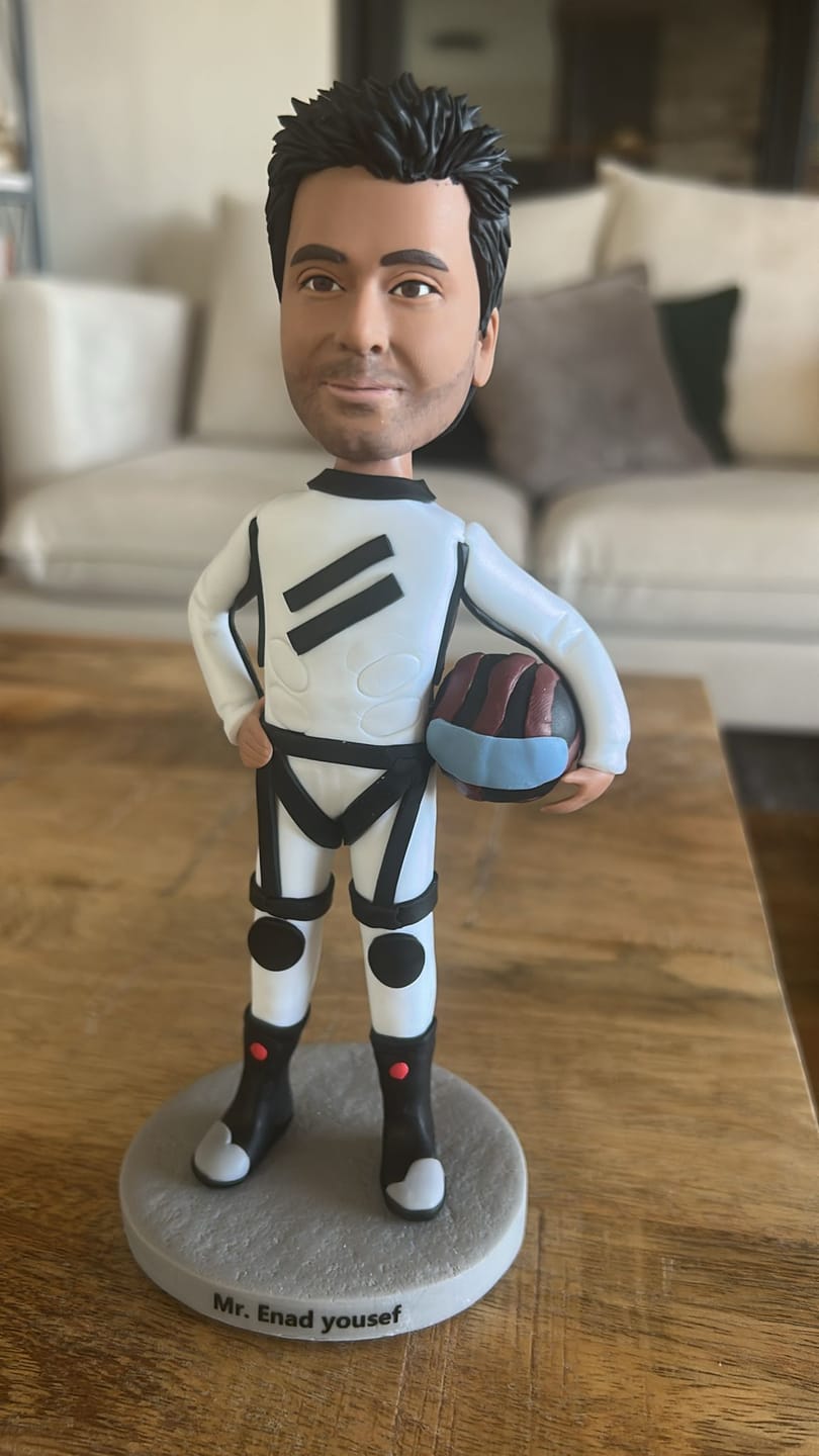 Customer photo review of בובת MINI ME - נהג מרוצים