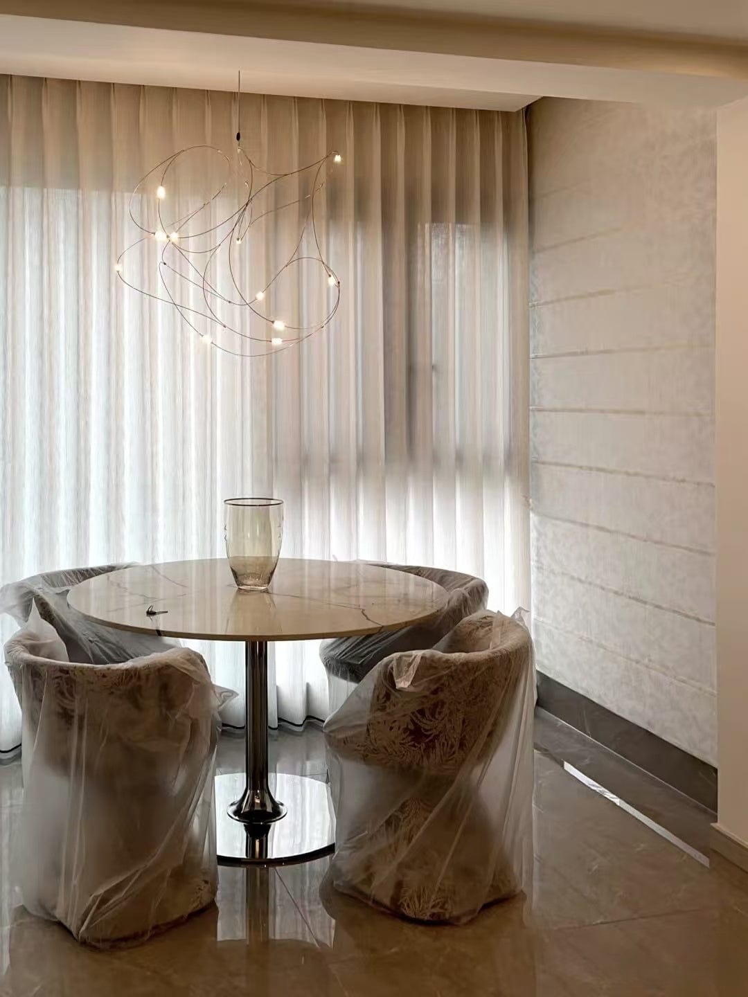 Customer photo review of Flock of Light Fireflies Abstract Brass Chandelier