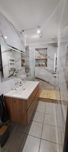 Customer photo review of Panneau Mural PVC Imitation Marbre Doré - Facile A poser