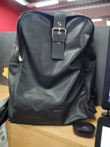 Reseña con foto de un cliente sobre Mochila Notebook Hebilla
