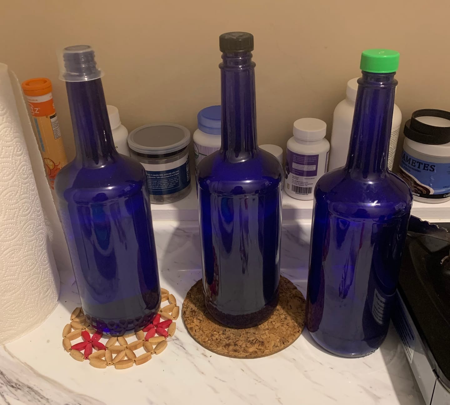 Customer photo review of Botella Vidrio One Liter Azul Cobalto