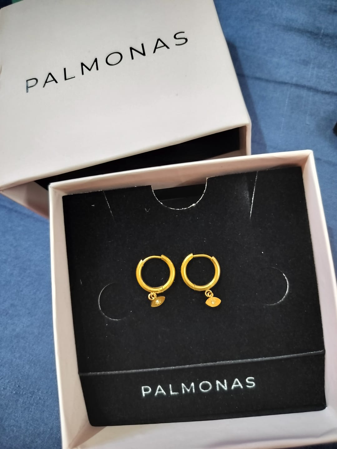 Customer photo review of Tiny Iris Star Hoop Earrings