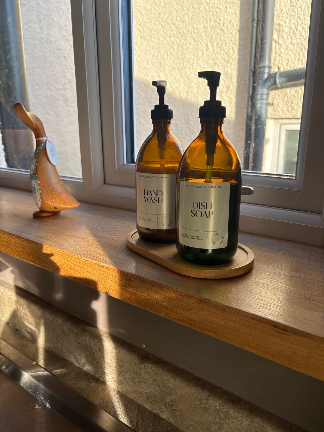 Customer photo review of Set of 2 Amber Glass Bottles (Black Plastic Pump) & Bamboo Tray