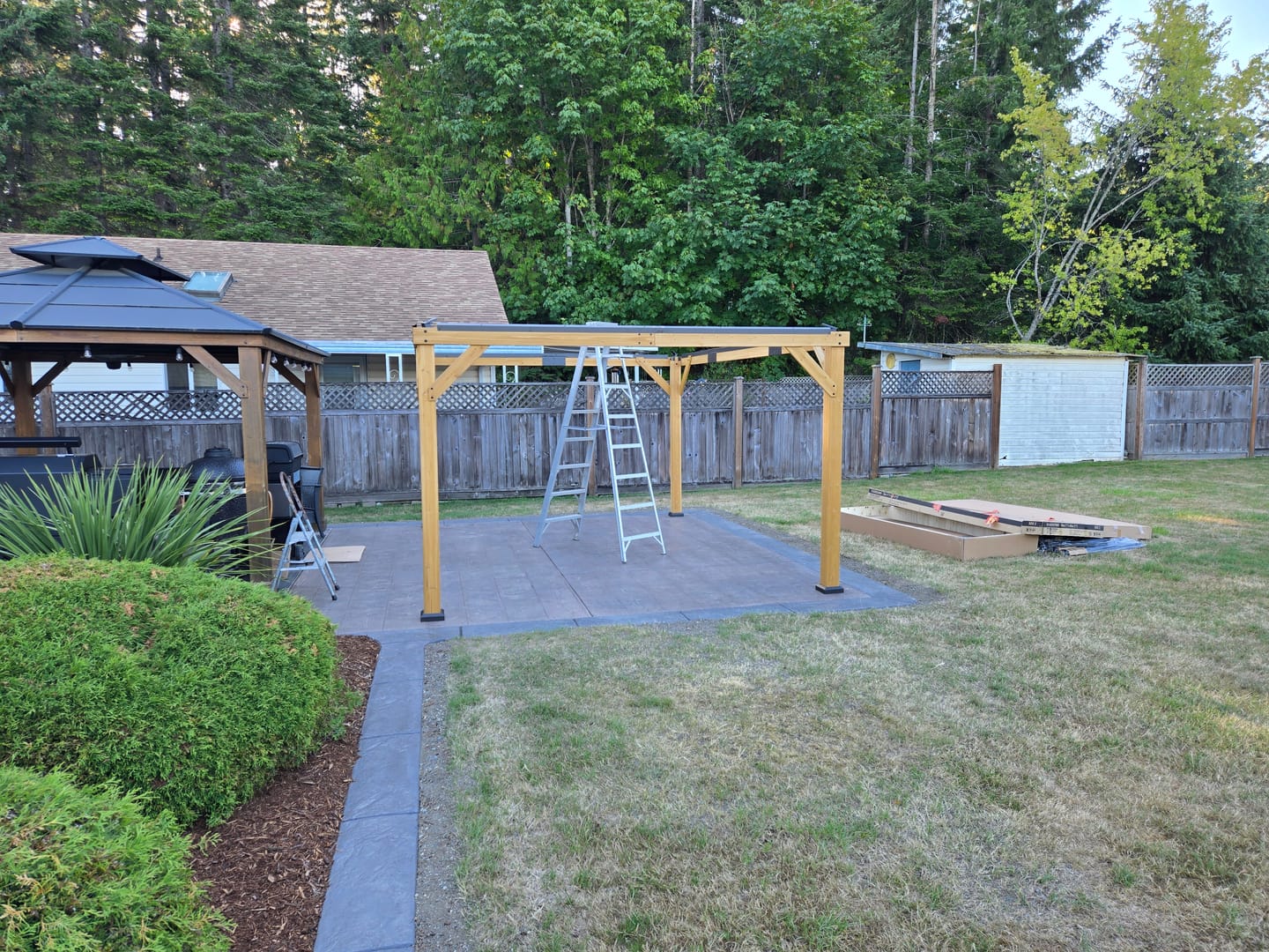 Customer photo review of SUNJOY 12x16 Outdoor Cedar Framed Gazebo with 2-tier Metal Roof and Ceiling Hook - Standard Natural Cedar