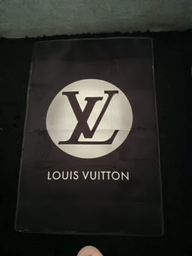 Customer photo review of Louis Vuitton old silver & black living room carpet